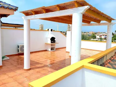 Un balcón o terraza de Ático con solarium Veramar 4 dos dormitorios en 1ª línea de playa