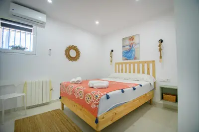Cama o camas de una habitación en Natura Mediterranea 2 dormitorios naturista junto al mar