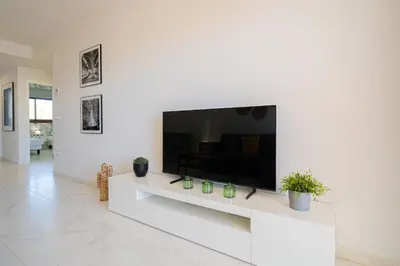 Una televisión o centro de entretenimiento en Casa Sana