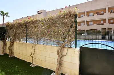 Piscina en o cerca de Vera Playa Bajo 2 Terrazas Jardín Piscina Parking