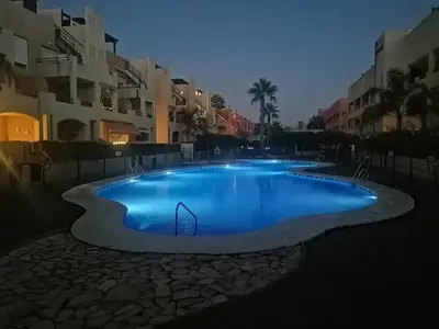 Piscina en o cerca de Vera Playa Bajo 2 Terrazas Jardín Piscina Parking