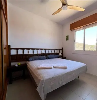 Cama o camas de una habitación en The three bedrooms Casa Barta - 300m from the beach with a beatiful see view from the terrace and private parking