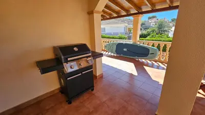 Un balcón o terraza de The three bedrooms Casa Barta - 300m from the beach with a beatiful see view from the terrace and private parking