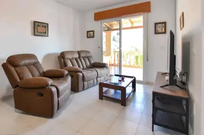 Zona de estar de The three bedrooms Casa Barta - 300m from the beach with a beatiful see view from the terrace and private parking