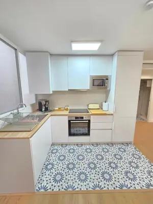 Una cocina o zona de cocina en Apartamento Mariacastaña