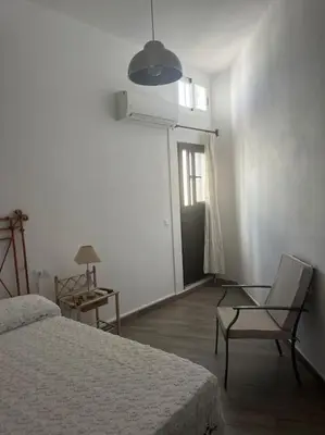 Cama o camas de una habitación en La Oficina