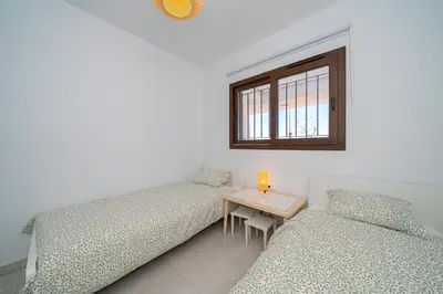 Cama o camas de una habitación en El Paseo