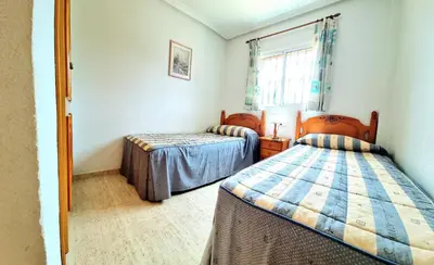 Cama o camas de una habitación en Dúplex 3 dormitorios Veramar 3 soleado