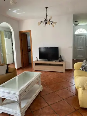 Una televisión o centro de entretenimiento en CASA EL RÍO