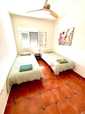 Cama o camas de una habitación en Casa Mariposa