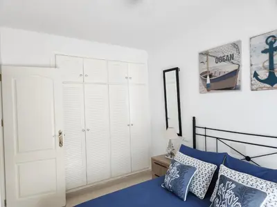 Cama o camas de una habitación en Triplex Adosado de cuatro dormitorios de esencia marítima a 2 minutos de la playa!