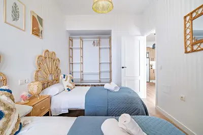 Cama o camas de una habitación en APARTAMENTO BELLAVISTA beach