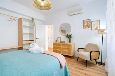 Cama o camas de una habitación en APARTAMENTO BELLAVISTA beach