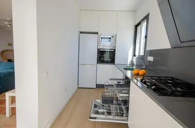 Una cocina o zona de cocina en Laberinto 25 Puerto Rey