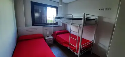 Cama o camas de una habitación en La Ortiguilla