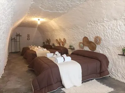 Cama o camas de una habitación en Cueva la Trapera