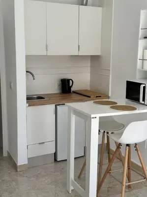 Una cocina o zona de cocina en Vive Vera Rentals - Acogedor Estudio Vera Colina