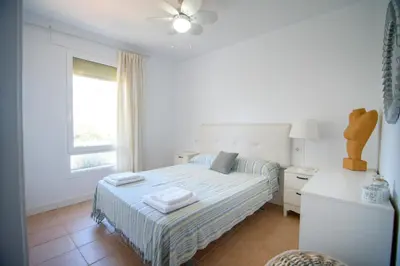 Cama o camas de una habitación en Mediterranea 7 Vera Playa Baria tus momentos frente al mar