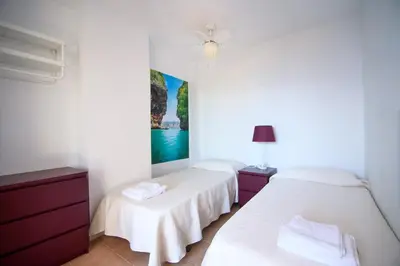 Cama o camas de una habitación en Mediterranea 7 Vera Playa Baria tus momentos frente al mar