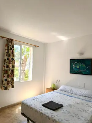 Cama o camas de una habitación en Apartamento Naturista Vera Playa