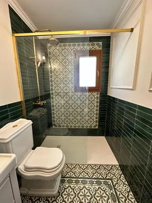Un baño de Casa de Carolina Vera Costa-bajo
