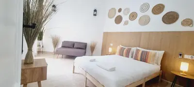 Cama o camas de una habitación en Natural Home Beach - Apartamento con aire