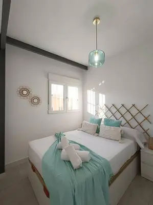 Cama o camas de una habitación en Los Santos 2 Suites, playa a 1 min, 2 Hab, WiFi y Aire acondicionado
