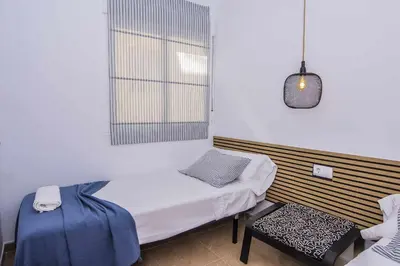 Cama o camas de una habitación en Apartamento Bajel - Céntrico, cerca de la playa.