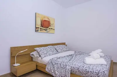 Cama o camas de una habitación en Apartamento Bajel - Céntrico, cerca de la playa.