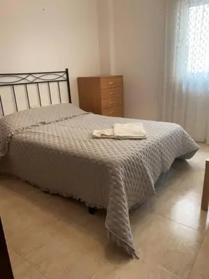 Cama o camas de una habitación en Adra apartment 2nd line to sea