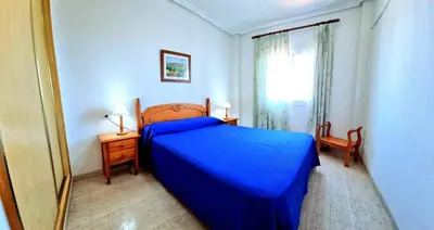 Cama o camas de una habitación en Ático con vistas al mar Veramar 5 dos dormitorios 2ª planta