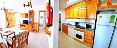 Una cocina o zona de cocina en Ático con vistas al mar Veramar 5 dos dormitorios 2ª planta