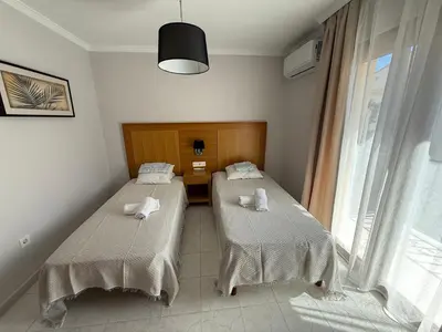 Cama o camas de una habitación en Duplex Olimp Vera Costa