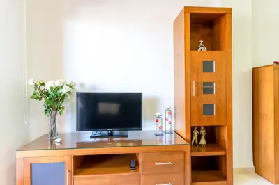 Una televisión o centro de entretenimiento en Brisas Almerimar R&R
