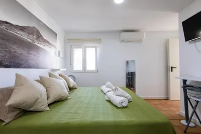 Cama o camas de una habitación en Cortijo EL CHAMAN LOS ESCULLOS