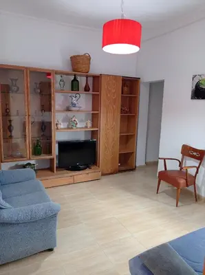 Una televisión o centro de entretenimiento en Casa Adra