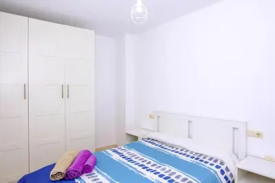 Cama o camas de una habitación en Apartamento La Puntica