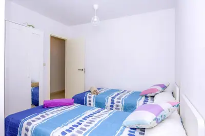 Cama o camas de una habitación en Apartamento La Puntica
