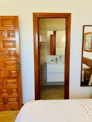 Cama o camas de una habitación en La Barraca B - Descanso Familiar con gran patio en entorno tranquilo cerca del mar
