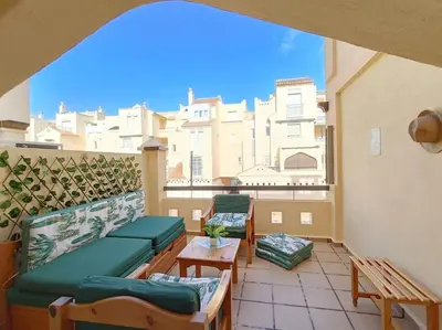 Zona de estar de Apto Roquetas con terraza, a 1min de la playa, garaje y piscina
