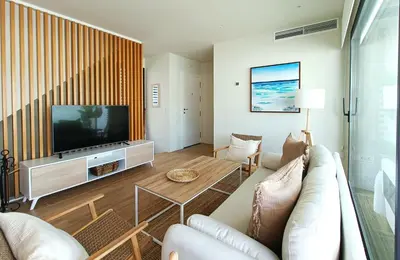 Una televisión o centro de entretenimiento en San José Suites 3 Hab, Piscina, solárium y WiFi