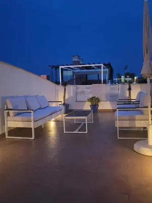 Zona de estar de Apartamento Mar del Sur Vera Playa- jacuzzi privado todo el año
