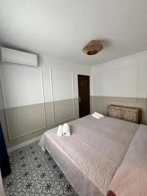 Cama o camas de una habitación en LA CASITA VERDE- cerca de la playa y con piscina abierta todo el año
