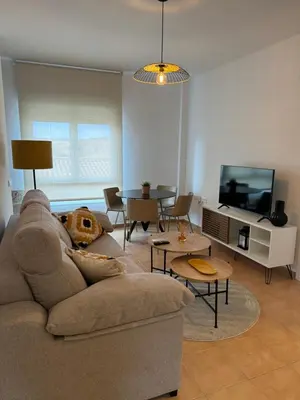 Una televisión o centro de entretenimiento en Apartamentos El Llano Málaga 7