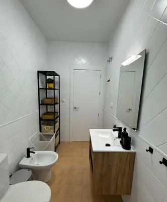 Un baño de Apartamentos El Llano Málaga 7