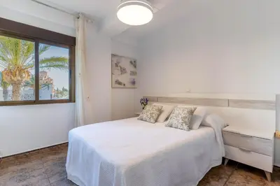 Cama o camas de una habitación en Apartamento Gaviotas II R&R
