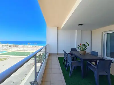 Un balcón o terraza de Mar y Sal 11 Suites, gran terraza con vistas al mar, 2 Hab y piscina