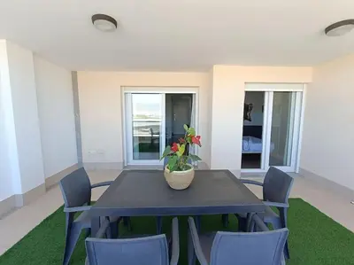 Zona de estar de Mar y Sal 11 Suites, gran terraza con vistas al mar, 2 Hab y piscina