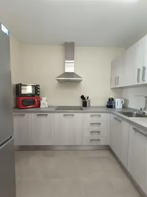 Una cocina o zona de cocina en Mar y Sal 11 Suites, gran terraza con vistas al mar, 2 Hab y piscina