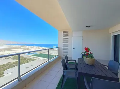Un balcón o terraza de Mar y Sal 12 Suites, gran terraza con vistas al mar, 2 Hab, garaje y piscina